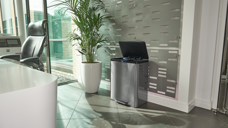 Office corner with modern black office chair