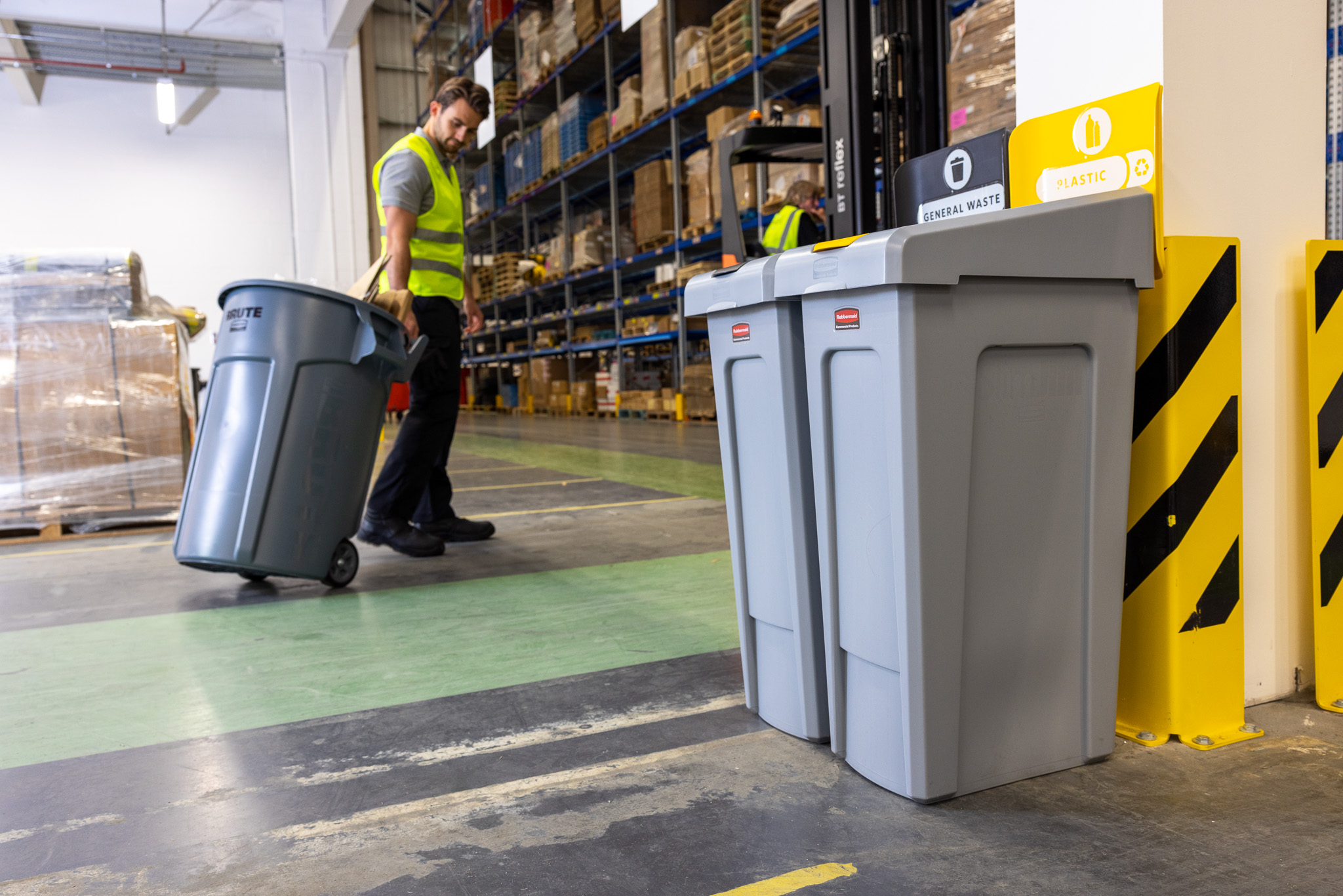 BRUTE bin and Slim Jim Recycling Station in a warehouse